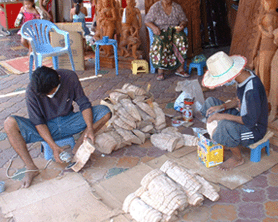 Wood carvers on streets of Siem Reap