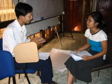 Khmer Institute of Democracy interns discuss cooperative learning methodology at a training given by the authors 