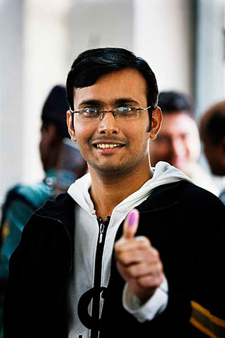 A proud voter gives the thumbs-up
