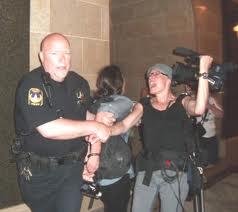 The arrest of journalist Sam Mayfield 