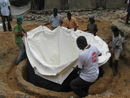 Brazilian and Haitian farmers are together constructing 1,200 cisterns in rural Haiti. Photo by Federico Matias