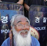 At protest against base on Jeju Island