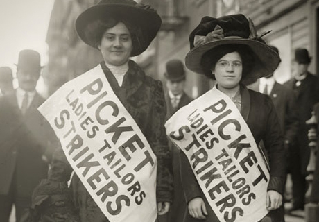Two strikers from the Ladies Tailors union stand on the picket line during the 1910 