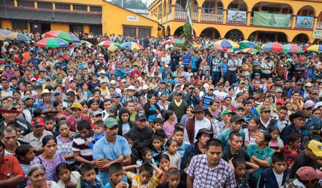 Thousands of Q’eqchi’ Maya farmers gather in Chisec, Guatemala in 2015 to celebrate Guatemalan indigenous campesino rights and resistance. Photo by Jeff Abbott/WNV