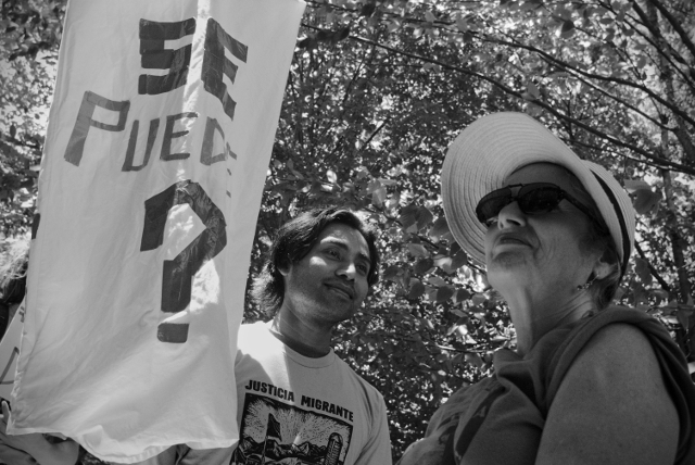 "Yes we can?" Migrant Justice organizers and allies take shelter from the sun for a few moments between marching sessions.