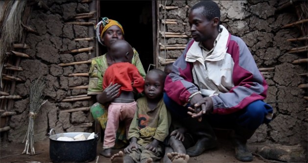 Saidi Olivier, a displaced farmer in North Kivu, Democratic Republic of the Congo (DRC) with his family in an IDP camp. Credit: IDMC