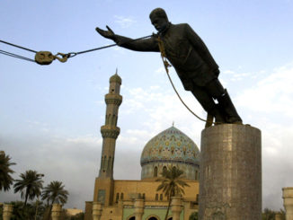 "Iraq was bombed by all US Presidents since George H. Bush in 1991." - Ramzy Baroud. Photo: Toppling a statue of Saddam Hussein in Iraq, 2003.