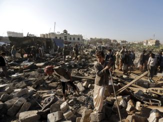 People searching through the rubble at site of Saudi air bombing in Yemeni capital of Sana’a on March 26, 2015. (Photo by Khaled Abdullah Ali/Reuters)