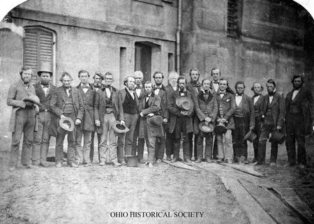 The 20 arrested Oberlin Rescuers, photographed at the Cuyahoga County Jail in April 1859.