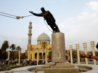 U.S. Marines pull down the statue of Saddam Hussein in the center of Baghdad, April 9, 2003. Credit: Mirrorpix/Getty Images