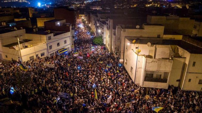 Thousands of protesters crowd the streets of the northern Moroccan city of Al-Hoceima, during a demonstration demanding the release of Nasser Zefzafi, head of the Hirak on May 31, 2017. Photo credit: AFP