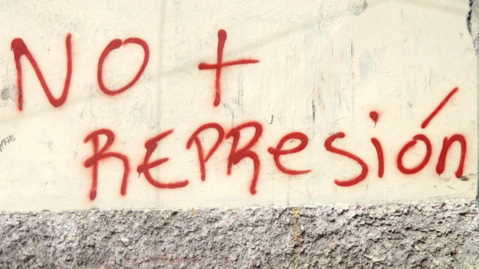 "No More Repression," reads a graffiti message on a wall in downtown Tegucigalpa. Photo by Sandra Cuffe