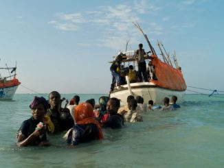 Migrants prepare to cast off the beach at Shimbiro, Somalia, for a perilous journey across the Gulf of Aden to Yemen and beyond. Photo: Alixandra Fazina/Noor