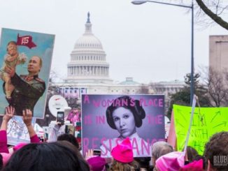 Protest signs at the Women’s March in Washington, D.C. last year. (Wikimedia / Mark Dixon)