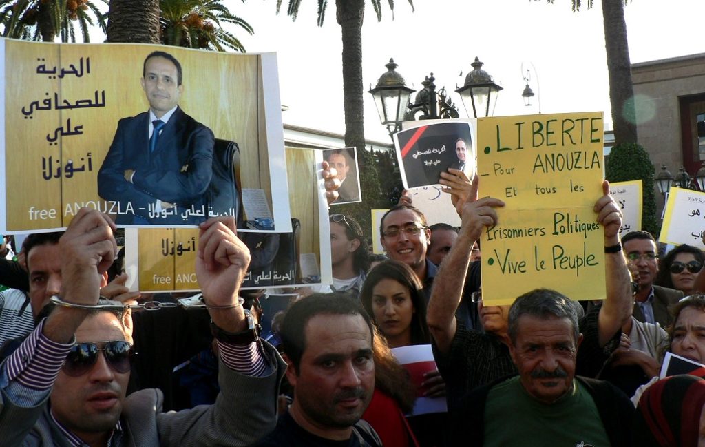 Protests in Rabat, Morocco calling for the release of journalist Ali Anouzla in 2013. Journalist and Al Aoual news website founder Soulaiman Raissouni is pictured in the center. Photo credit: Ilhem Rachidi