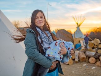 This portrait of Zintkala Mahpiya Win Blackowl and her daughter, Mni Wiconi, was created by Indigenous photographer Tomás Karmelo Amaya on Nov. 16, 2016, moments before a women’s meeting at Oceti Sakowin. Photo by Tomás Karmelo Amaya.