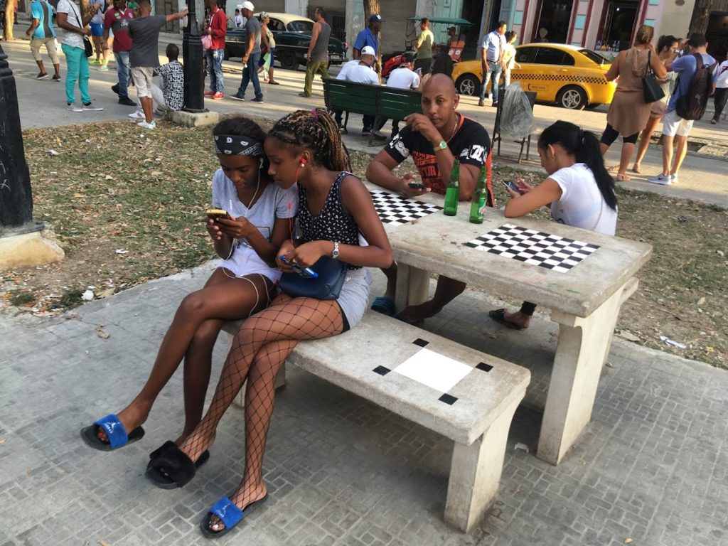 Cristo Parc, one of the many popular wi-fi (pronounced wee-fee) hot spots in Havana. Photo credit: Daniel Winthrop
