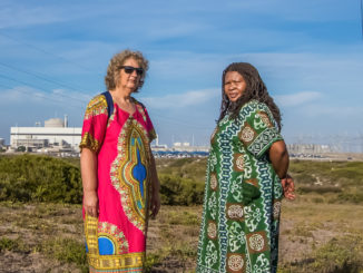 Liz McDaid and Makoma Lekalakaka in front of the South Africa’s only nuclear power station – Koeberg. Photo: Goldman Environmental Prize