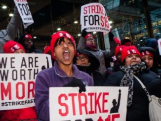 "Among numerous demands, they’re calling for federal and state living wage laws, a guaranteed annual income for all people, full employment, and the right to unionize." (Photo: Shutterstock)