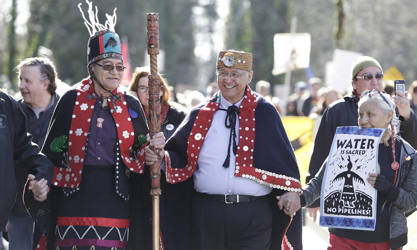Indigenous leaders, coast protectors, and others demonstrate against the expansion of the Trans Mountain pipeline expansion project in Burnaby, British Columbia, Canada, on March 10, 2018. Photo by Jason Redmond/Getty Images
