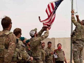The U.S. flag is lowered as U.S. soldiers leave Helmand province, southern Afghanistan, May 2, 2021 / credit: Afghan Ministry of Defense Press Office