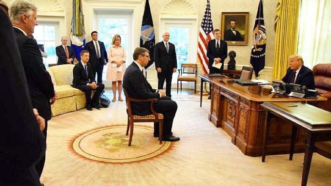 Serbian President Aleksandr Vucic with U.S. President Donald Trump in the Oval Office in 2020.