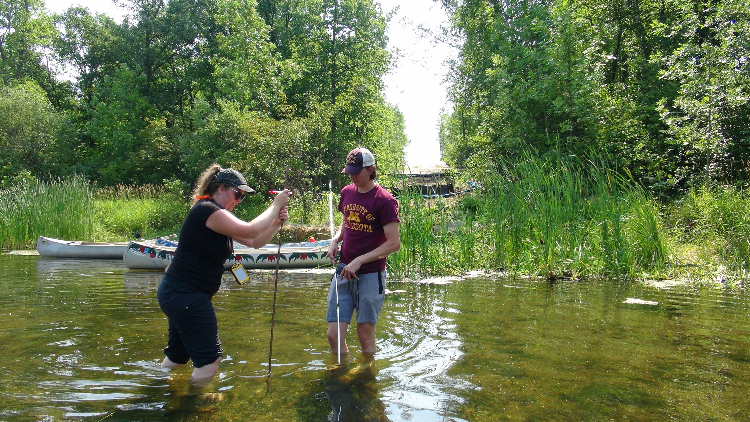 University of Minnesota students testing water temperatures in the river above the location where Enbridge installed Line 3.