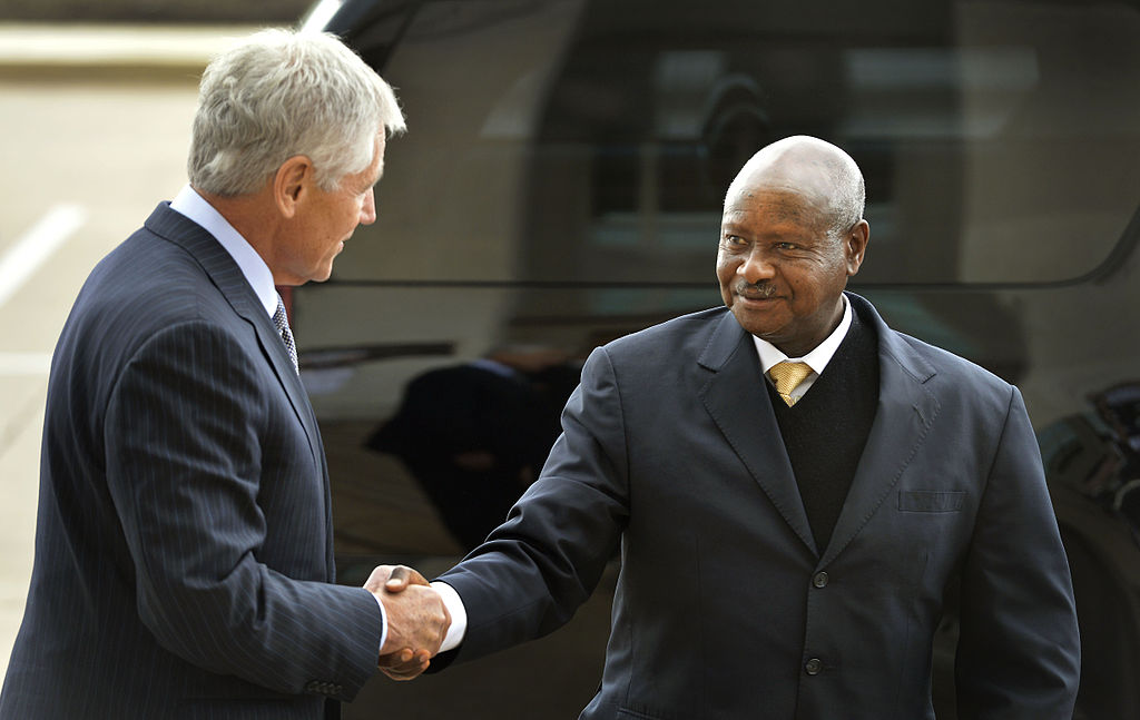 Ugandan President Yoweri Museveni is greeted by U.S. Department of Defense Chuck Hagel in 2013 / credit: Glenn Fawcett via DOD