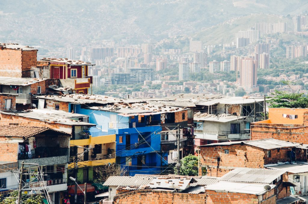 Pollution in Medellín, Colombia. The United Kingdom has red-listed seven countries in the Americas, requiring even vaccinated travelers to quarantine. This has been lambasted as a political move in light of the upcoming COP26 in Glasgow, Scotland / credit: <a href="https://unsplash.com/@miloezger?utm_source=unsplash&utm_medium=referral&utm_content=creditCopyText">Milo Miloezger</a> on <a href="https://unsplash.com/s/photos/colombia-climate?utm_source=unsplash&utm_medium=referral&utm_content=creditCopyText">Unsplash</a>