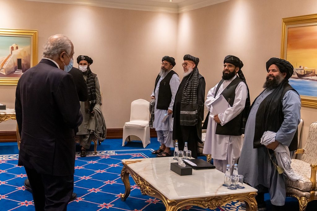 U.S. Special Representative for Afghanistan Reconciliation Zalmay Khalilzad (left) meets on November 21, 2020, with a Taliban delegation in Doha, Qatar / credit: U.S. State Department