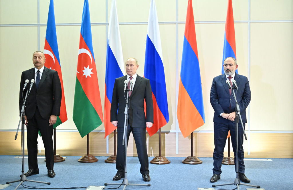 Under the mediation of Russian President Vladimir Putin on November 26 in the southern Russia city of Sochi, the leaders of rival countries Armenia and Azerbaijan agreed to ease remaining tensions after their 2019-20 war over the Nagorno-Karabakh region. Armenian President Nikol Pashinyan (right) and Azerbaijan's President Ilham Aliyev (left) flank Putin / credit: commonspace.eu