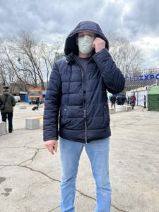 Alec Shevchenko, a 70-year-old Ukrainian refugee and former prosecutor from Kharkiv, kept on his surgical mask for the photo, out of fear of repercussions for expressing his views / credit: Fergie Chambers