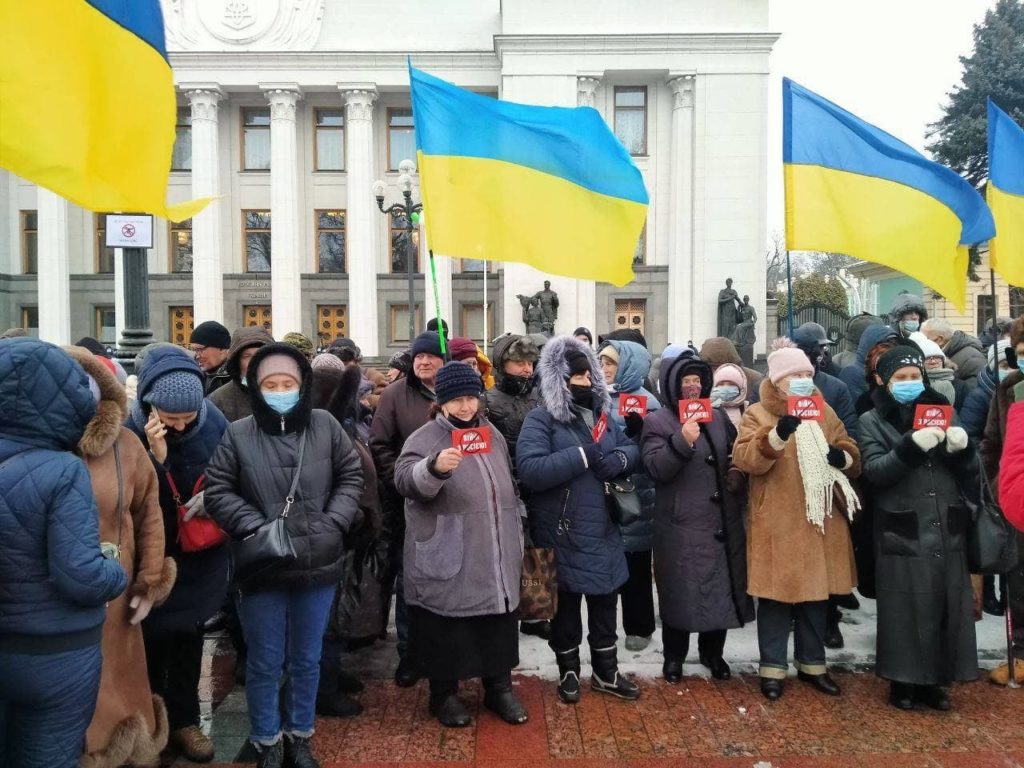 Ukrainians protested on February 10 holding signs that read, "No war with Russia" / credit: Facebook / Ukraine Peace Movement