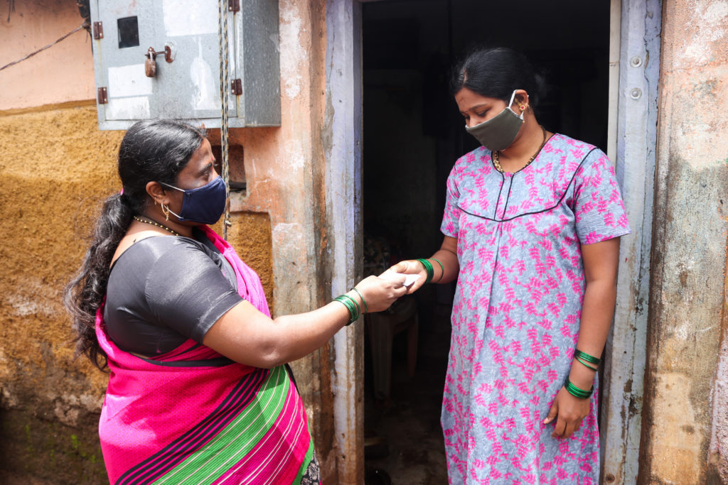ASHA Rani Koli from Kolhapur’s flood-affected Bhendavade village surveying her community after the July 2021 floods. “Even my house was ravaged by the 2019 and 2021 floods, but we keep working to make sure everyone remains safe,” she said / credit: Sanket Jain