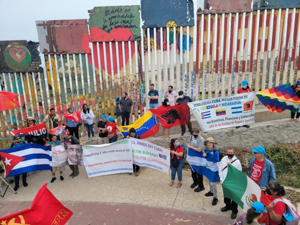 Anti-imperialist organizations taking part in the Workers’ Summit of the Americas gathered June 12 in Tijuana at the Mexico-United States border in solidarity with the Sandinista, Cuban and Bolivarian Revolutions, in repudiation of the U.S./OAS-organized Summit of the Americas / credit: Kawsachun News / Twitter