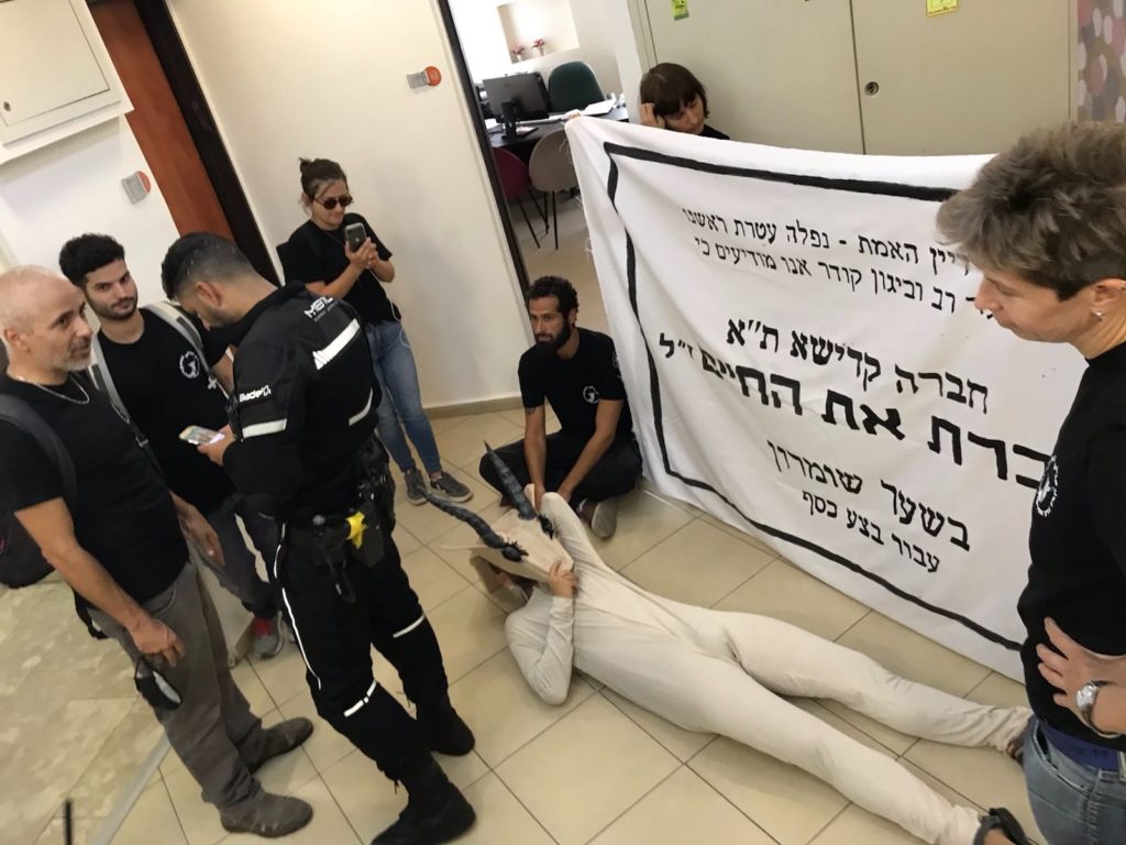 Israeli activists from Climate One attempted to block the head office of Chevra Kadisha, the Tel Aviv burial society promoting the cemetery’s construction in Nahal Rabah (or Wadi Rabah in Arabic) / credit: activists