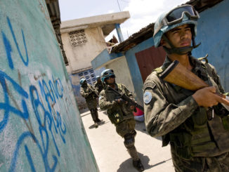 United Nations peacekeepers from Brazil conduct a security patrol in Cité Soleil, Haiti, during the second round of senatorial elections in 2009 / credit: United Nations