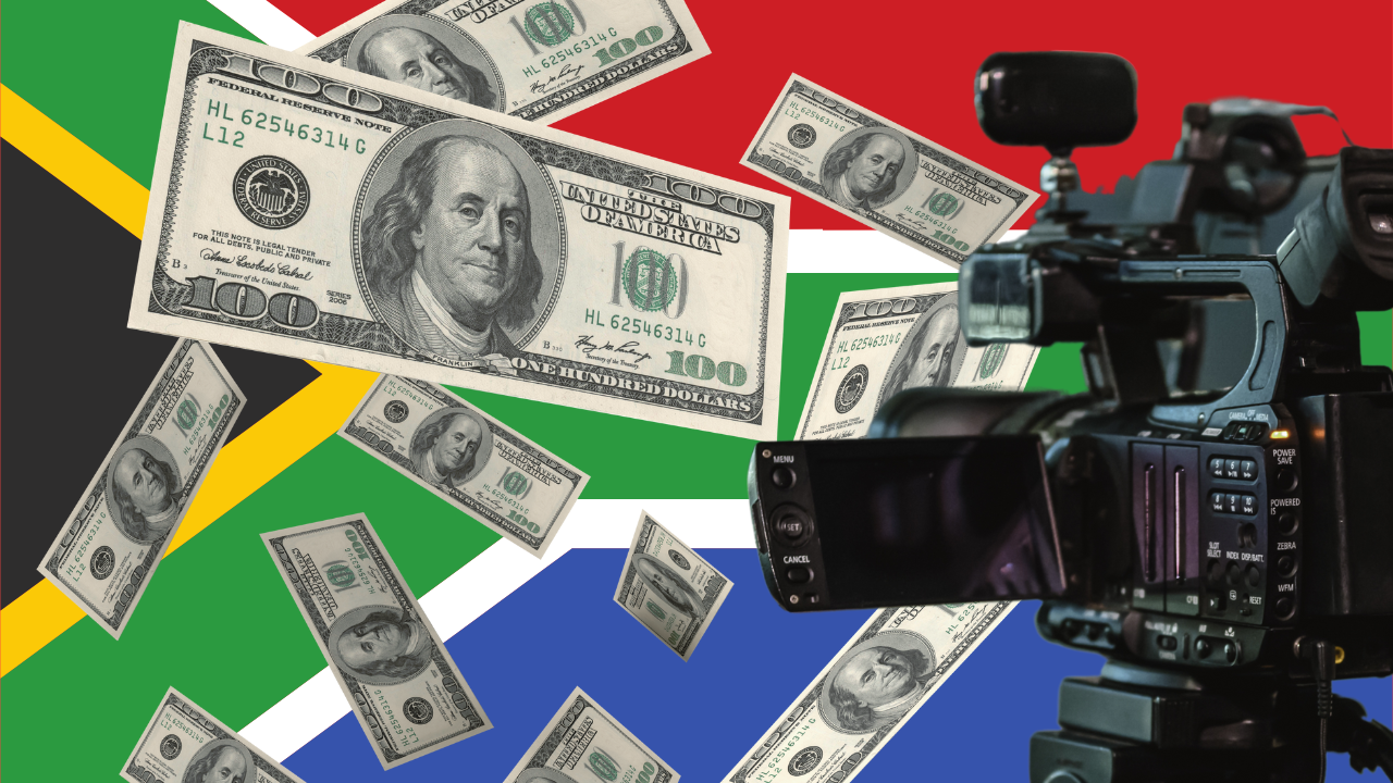 The South African flag, U.S. dollars and a video camera / credit: Toward Freedom photo illustration