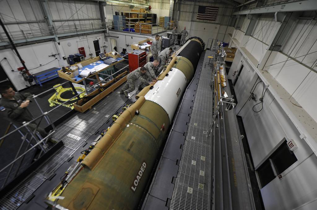 U.S. Air Force personnel from the 576th Flight Test Squadron Missile Handling Team install a cable raceway on an intercontinental ballistic missile at Vandenberg Air Force Base, California / credit: U.S. Air Force Staff Sgt. Jonathan Snyder 