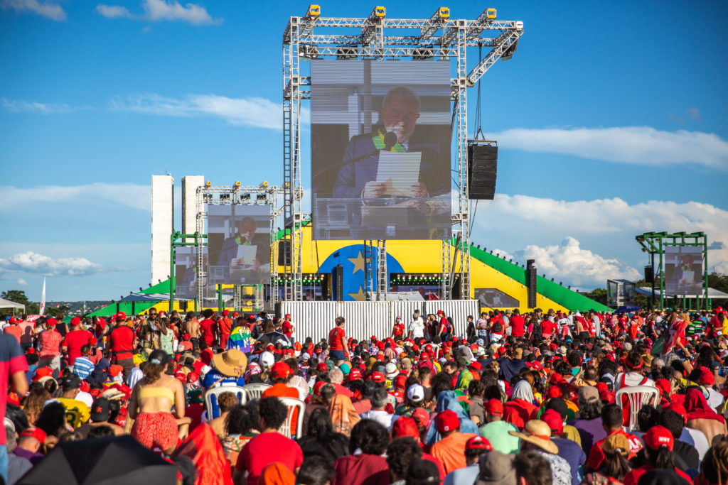 Brazilians watch Luiz Inácio "Lula" da Silva speak on a large screen at the January 1 inauguration held in the center of Brasilia / credit: Antonio Cascio