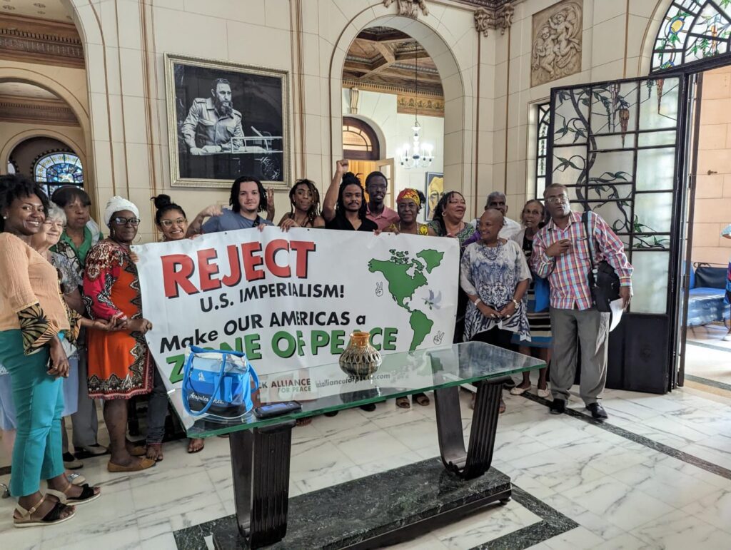 The Zone of Peace campaign was launched in three cities, including in Havana, Cuba. Here, Black Alliance for Peace members pose with members of the Instituto Cubano de Amistad con los Pueblos (ICAP), an organization that encourage people-to-people exchanges / credit: Black Alliance for Peace