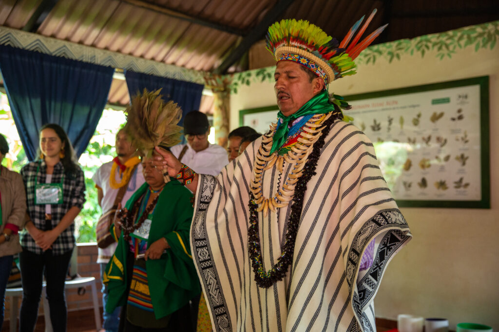 Taita Pablo Crispín Chindoy held a spiritual ceremony at the end of a meeting in March in Mocoa with Colombian Minister of Mines and Energy Irene Vélez Torres. Indigenous communities, and social and activist groups, from the Putumayo department organized this meeting to provide the minister with their case for requesting the end of the Libero Copper and Gold project in the Mocoa area / credit: Antonio Cascio